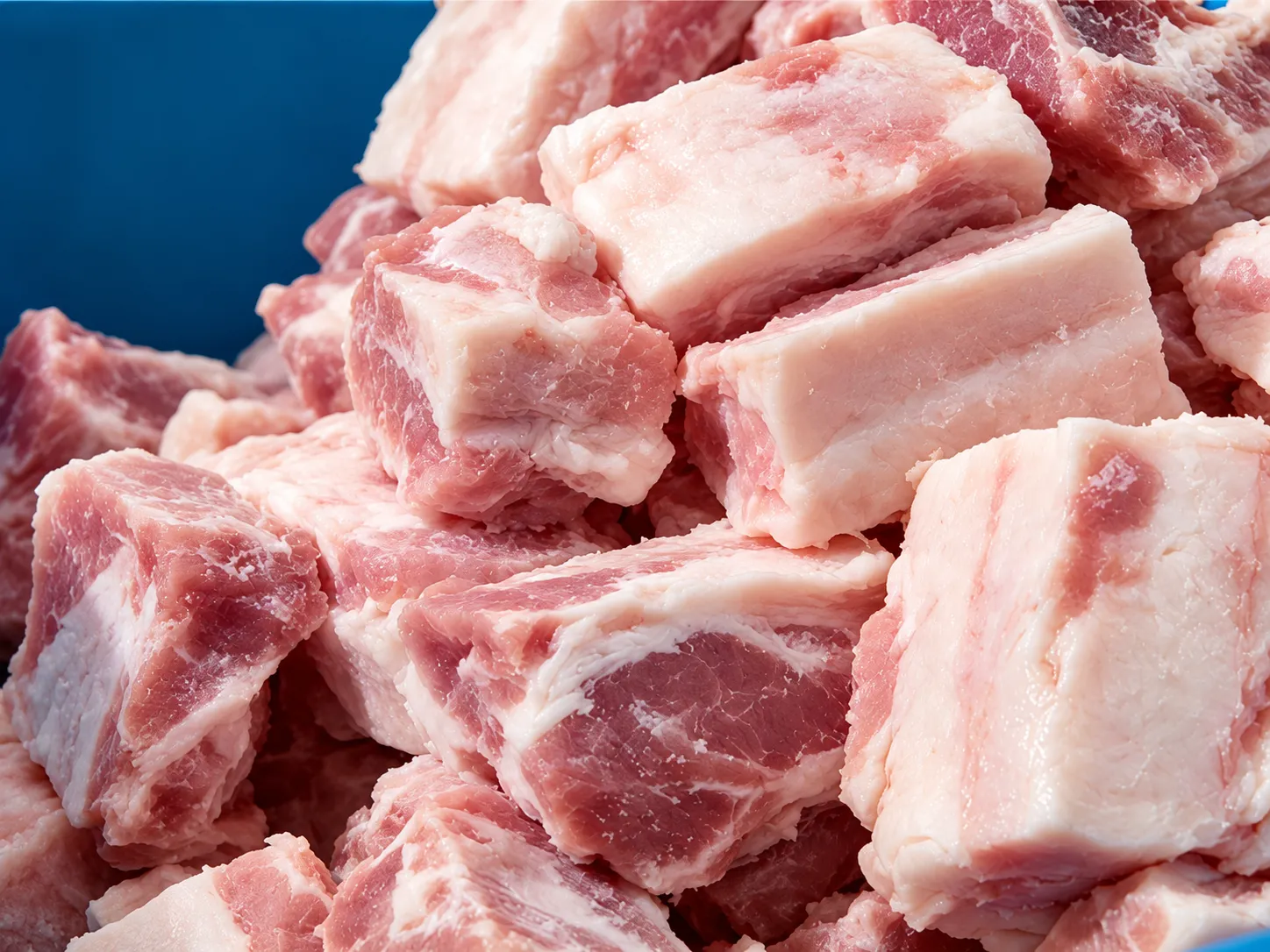 QK-5T frozen meat block cutter output showing cut piece sizes